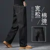 Nuevos pantalones vaqueros de alta gama para otoño 2026 para hombre, estilo recto holgado, colección de primavera y otoño, lavados y elásticos, pantalones casuales para hombres de mediana edad