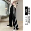 Pantalones Negros de Pierna Ancha para Mujer Estilo Primavera y Otoño 2026 Nuevos de Cintura Alta Caídos Sueltos Casuales de Pierna Recta Rayados Deportivos