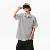 Camisa Polo Manga Curta Falsa Duas Peças Listrada Retro Americana Masculina Feminina Marca Tendência Solta Versátil Camiseta de Casal Top Tendência