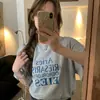 Camiseta Branca com Estampa de Letras Estilo Retrô Americano Manga Curta Feminina Verão 2026 Novo Estilo Meia-Manga Solta Casual
