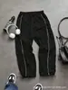 Calça de Treino Masculina Leve de Nylon Cintura Elástica Faixa Refletiva Calças Esportivas Casuais