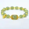Nuevo brazalete de estilo chino inspirado en el loto con cubos de azúcar de jade Hetian, esmalte chapado en oro y colgante de loto con cuentas de jade lisas