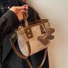 Bolso pequeño de alta gama para mujer, bolso bandolera de hombro combinable, moderno y súper popular, de estilo nicho, 2024