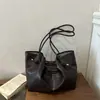 Bolso de Textura Transfronteriza de Gran Capacidad para Mujer Nuevo Estilo 2026 Moda para Viajar y Trabajar Bolso de Hombro Único y de Mano Bolso Tote Casual de Moda