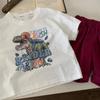 Ropa para niños Camiseta de manga corta de dinosaurio para niños Verano 2025 Nuevo estilo Estilo occidental Moda de verano para niños Camiseta de manga corta para bebé niña