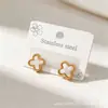 Brincos de Tarraxa de Trevo de Quatro Folhas de Venda Quente Transfronteiriça Nicho High-End Aço Inoxidável Cor Duradoura Coração Totalmente cravejado de Diamante Joia Versátil de Luxo Leve