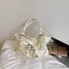 Diseño de alta calidad estilo chica picante bolso tote con hebilla para mujer 2026 nuevo bolso versátil de un solo hombro cruzado para la ciudad