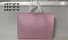 Bolsa no tejida de color spot recubierta con prensado en caliente bolsa de regalo publicitaria bolsa de compras de ropa no tejida portátil impresión de logotipo
