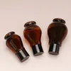 Botella gotero con forma de calabaza individual en stock 30 ml Botella de vidrio para aceites esenciales 10 ml Botella dispensadora de doble cabezal de bola rodante para loción corporal 5 ml