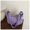 Bolsa de Ombro de Lona de Grande Capacidade Feminina 2025 Primavera e Verão Nova Cor Pura Simples Moda Casual Bolsa Transversal Tendência