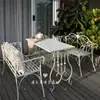 Ocio al Aire Libre Balcón Abierto Jardín Patio Cafetería Tienda de Té con Leche Interior Combinación de Mesa y Sillas de Hierro Conjunto de Tres o Cinco Piezas