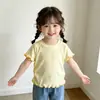 Top de canalé para niña estilo coreano, manga corta con volantes en el bajo, camiseta tipo dopamina ajustada para bebés, adecuado para usar solo o con otras prendas, venta al por mayor de ropa infantil