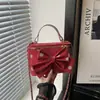 Otoño 2026 Nuevo Estilo Bolsa Tote Pequeña para el Trabajo y el Trayecto Diario Bolso Cubo de Cadena Individual para Hombro Cruzado para Mujer Bolsas para Mujer al por Mayor