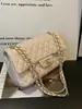 Bolsa feminina de luxo, novo modelo 2026, bolsa de corrente de grande capacidade em couro envernizado, bolsa de ombro e transversal versátil estilo Chanel