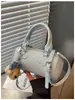 Bolso pequeño súper moderno y exquisito para mujer, nueva colección 2026, con un toque de alta gama, perfecto para el verano y el uso diario, un elegante bolso de hombro o bandolera.