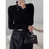 Camiseta básica de cuello alto de lana fina para mujer, nuevo estilo de principios de otoño, corte ajustado, simple y elegante, tejido de punto de alta gama para usar en capas