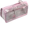 Estuche transparente de doble capa estilo ins rosa claro con alas, alto atractivo estético, caja de papelería de gran capacidad para almacenamiento en escritorio para estudiantes