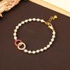 Pulsera minimalista japonesa y coreana de doble anillo redondo con incrustaciones de diamantes y perlas para mujer, lujo ligero de alta gama, versátil, nicho, con cuentas, venta al por mayor