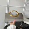 Bolso de Mano de Cadena Elegante Francés Verano 2026 Nuevo Moderno de Gama Alta Simple Versátil de Hombro Cruzado