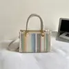 Bolso de mujer de alta gama de nicho, nuevo bolso cruzado de moda primavera 2026, bolso cuadrado pequeño tejido a mano súper popular