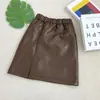 Falda de Cuero Rantuo para Niñas con Abertura, de Longitud Media, Cintura Alta Elástica, Artículo Popular de Tiktok, Estilo Ins, Stock Listo para Exportación, Dropshipping