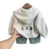Jaqueta infantil com forro de fleece 2026 nova estilosa com capuz de desenho animado cardigã jaqueta de fleece para meninas bebê top casual