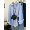 Camisa de rayas azules y blancas, de longitud media, corte holgado, casual, adelgazante, nuevo modelo transfronterizo 2026