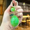 Accesorios creativos transfronterizos de mango y limón, llaveros de coche modernos y populares, colgantes de bolsa de frutas de alto valor