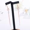 Nuevos aretes creativos de borla de moda para mujer, acero de titanio, oro rosa, cubo, circonita inteligente, aretes largos al por mayor