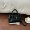 Bolso de mano con patrón de lichi, bolso cruzado simple y elegante, nuevo modelo otoño 2026, diseño retro de nicho, bolso de hombro para el día a día
