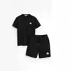 Ropa de exterior Mengjia conjunto de shorts de algodón de manga corta para verano nuevo insignia bordada shorts shorts deportivos holgados