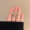 Estilo Coreano Nuevo Estilo Simple Clip para Oreja de Moño de Amor Incrustado con Diamantes Moda Dulce Versátil Pendientes para Estudiantes sin Agujeros en las Orejas para Mujer