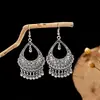 Aretes colgantes de moda huecos para mujer de estilo exótico europeo y americano transfronterizo, retro, literario, clásico y digno, con gancho para la oreja que combinan con todo