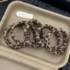 Elástico de Cabelo Estampado de Leopardo Estilo Ins Retrô Coreano para Mulheres, Elástico para Rabo de Cavalo, Corda para Coque, Novo Modelo Durável para Adultos