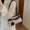 Bolso tipo baguette retro a rayas y lunares para mujer, nuevo estilo 2026, con hebilla de cinturón, bolso de axila, adecuado para el trabajo y los desplazamientos, de mano o de hombro