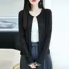 Nuevo cárdigan de punto para mujer otoño/invierno 100% lana fina con cuello redondo, mangas largas, puños de color contrastante y un top de cachemira hueco