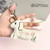 Muñecos para lanzar en bodas, llaveros de peluche, colgantes de muñecos para mochilas de mujer, pequeños regalos promocionales al por mayor