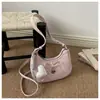 2026 Verano Nuevo Moda Coreana Nicho Diseño Dulce Fresco Personalidad Tendencia Elegante Bolso de Mano y Bolso Cruzado