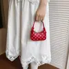 Monedero de lunares moderno estilo coreano para niños y niñas, mini bolso de mano compacto para bebé con tirador de cremallera en forma de corazón, bolso accesorio infantil