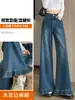 Jeans wide leg com bainha de orelha de madeira feminino outono e inverno senso de design cintura alta solto retrô micro flare comprimento total A14836