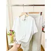 Nuevo top de algodón y lino de manga corta para verano con bordes festoneados, estilo casual holgado vintage, camiseta de manga corta con lazada en la espalda para mujer
