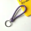 Llavero creativo de cuerda de cuero tejido a mano para pareja, llavero de coche, llavero al por mayor, colgante para bolso