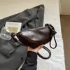 Bolso Cruzado de Hombro Casual de Gran Capacidad para Viajes, Estilo Nuevo Primavera 2026, Textura Simple, Bolso Croissant de Piel Suave, Bolso de Axila