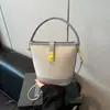 Bolsas de Mujer Transfronterizas 2026 Nueva Moda Primavera Tendencia Bolso de Mano Bolso Cubo Color Bloqueo Nicho Bolso de Hombro Cruzado