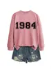 Amazon eBay sitio independiente casual simple cómodo mujer 1984 digital otoño e invierno nuevo cuello redondo manga larga sudadera
