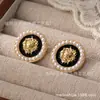 Novos Brincos com Design de Gotejamento de Óleo Pérola Artificial Tridimensional Cabeça de Leão Brincos de Luxo Leve Europeus e Americanos Brincos Transfronteiriços para Mulheres