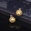 Campanillas de palacio huecas Colgante de bola redonda pequeña de imitación dorada Joyería hecha a mano DIY Colgante para carillón de viento Llavero Colgante Accesorios de collar