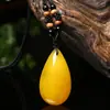Dropshipping de Transmissão ao Vivo Pingente Gota d'Água Amarelo Óleo de Galinha Âmbar de Segunda Geração Pingente de Cera de Abelha Corrente de Suéter Unissex Joia
