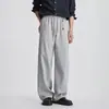 Calça Casual Yizhi Khmer de Corte Assimétrico para Homens, Outono Cor Sólida Solta Reta Versátil para o Dia a Dia Esportes Tendência