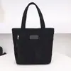 Bolso de mano simple de pana transfronterizo nuevo para mujer, bolsa grande de capacidad para lonchera de trabajo, bolso de mano de moda para mamá